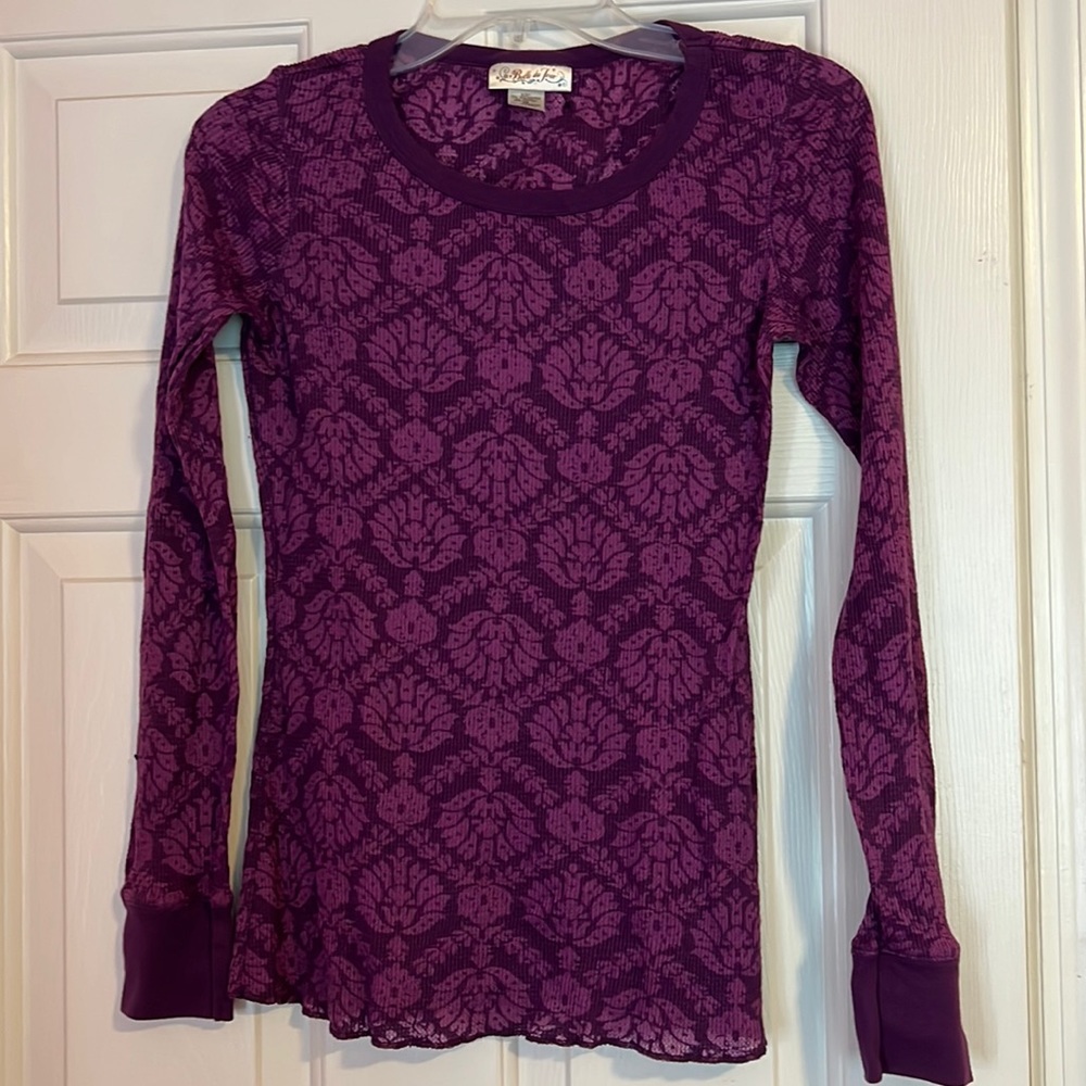 Purple long sleeve T shirt.